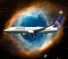 Airplane flying by galaxy